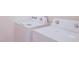 An eye-level shot featuring white laundry machines perfect for handling all your washing needs at 6933 Se 111Th Ln, Belleview, FL 34420