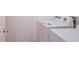 Bright laundry room featuring a side-by-side washer and dryer set for convenient chore management at 6933 Se 111Th Ln, Belleview, FL 34420