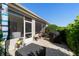 Outdoor patio and lanai with furniture and a grill, great for relaxation and entertainment at 7283 Sw 94Th Ave, Ocala, FL 34481