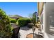 Private backyard featuring a well-maintained brick patio, lush greenery, and space for outdoor entertaining at 7283 Sw 94Th Ave, Ocala, FL 34481
