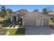 Beautiful one-story home with a well-maintained lawn and landscaped front yard at 7283 Sw 94Th Ave, Ocala, FL 34481