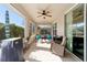 Enclosed patio offering an outdoor cooking area, comfortable seating, and a great view at 7283 Sw 94Th Ave, Ocala, FL 34481