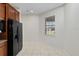 Bright breakfast nook with neutral paint, tile flooring, and exterior views at 7665 Sw 96Th Avenue Rd, Ocala, FL 34481