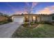 Inviting single-story home boasting well-manicured landscaping and a brick paver driveway at 8344 Sw 79Th Cir, Ocala, FL 34476