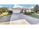 Attractive home with a brick-paved driveway and manicured landscaping at 8344 Sw 79Th Cir, Ocala, FL 34476