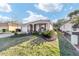 Well maintained home with a manicured lawn, mature landscaping, and a welcoming porch at 8344 Sw 79Th Cir, Ocala, FL 34476