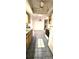 Sunlit kitchen features tile flooring, wooden cabinets, and standard appliances at 8449 Sw 106Th Pl, Ocala, FL 34481