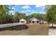 Well-maintained single-Gathering home with a modern design, attached garage, and a spacious front yard at 8850 Sw 125Th Ter, Dunnellon, FL 34432