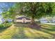 Charming single-story home with lush lawn and mature shade tree in a desirable neighborhood at 8869 Sw 194Th Ct, Dunnellon, FL 34432