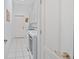 Clean and bright laundry room with storage and modern appliances at 8869 Sw 194Th Ct, Dunnellon, FL 34432