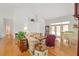 Spacious living room with hardwood floors and plenty of natural light at 8869 Sw 194Th Ct, Dunnellon, FL 34432