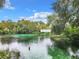 Picturesque view of the river, showcasing its clear water and natural beauty at 8869 Sw 194Th Ct, Dunnellon, FL 34432
