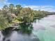 Picturesque view of the river, showcasing its clear water and dock with shade at 8869 Sw 194Th Ct, Dunnellon, FL 34432