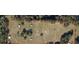 Birds eye view of the acreage with paddocks, sheds and other outbuildings at 10750 Nw 7Th St, Ocala, FL 34482