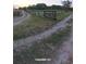 This property includes a dirt road entrance and fenced pasture ready for livestock at 10750 Nw 7Th St, Ocala, FL 34482
