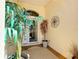 Inviting front porch decorated with plants and decorative accents enhancing the entryway's appeal at 11010 Se 174Th Loop, Summerfield, FL 34491