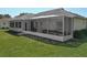 A cozy screened patio provides a seamless transition to the outdoors from this single-Gathering home at 11010 Se 174Th Loop, Summerfield, FL 34491