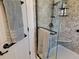 Beautiful bathroom featuring granite seat and tile detail at 11395 Sw 139Th St, Dunnellon, FL 34432