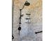 Tile corner shower with rainfall shower head, handheld sprayer, and convenient shelving at 11395 Sw 139Th St, Dunnellon, FL 34432