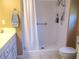 Bathroom featuring a tiled shower, toilet, and white vanity at 13780 Sw 111Th Ave, Dunnellon, FL 34432