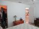 Bedroom showcasing a closet and glimpses of the kitchen area at 13780 Sw 111Th Ave, Dunnellon, FL 34432