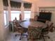 Bright breakfast nook with lots of natural light and a built-in hutch at 13780 Sw 111Th Ave, Dunnellon, FL 34432