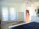A peek from the main bedroom back into the living areas of the home at 13780 Sw 111Th Ave, Dunnellon, FL 34432