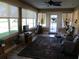 An additional view of the sunroom featuring a view to the large yard at 13780 Sw 111Th Ave, Dunnellon, FL 34432
