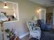 An adjacent sunroom features a seating area, large windows and a view to the outside at 13780 Sw 111Th Ave, Dunnellon, FL 34432