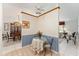 Cozy breakfast nook featuring chair rail detail, floral wallpaper, and charming decor at 13805 Se 87Th Ter, Summerfield, FL 34491