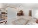 Open-concept layout connecting the kitchen, dining area, and living room, ideal for modern living and entertaining at 13805 Se 87Th Ter, Summerfield, FL 34491
