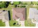 Aerial view of home shows roof, landscaping, and driveway at 17472 Se 112Th Ct, Summerfield, FL 34491
