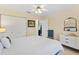 Bright bedroom featuring a ceiling fan, closet, and neutral tones at 17472 Se 112Th Ct, Summerfield, FL 34491