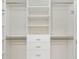 Walk-in closet with organizers, shelves, and drawers for ample storage at 17472 Se 112Th Ct, Summerfield, FL 34491