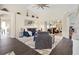 Spacious living area filled with natural light, showcasing tasteful furniture and contemporary design elements at 17472 Se 112Th Ct, Summerfield, FL 34491
