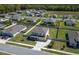 Aerial view of a well-maintained home with a spacious, fenced backyard in a suburban neighborhood at 1861 Ne 50Th Ter, Ocala, FL 34470