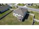 Aerial view highlighting the home's fenced yard, and charming covered patio for outdoor relaxation at 1861 Ne 50Th Ter, Ocala, FL 34470