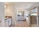 Bright bathroom with a double sink vanity, shower, separate tub, and light tile flooring at 1861 Ne 50Th Ter, Ocala, FL 34470