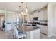 Modern kitchen features granite countertops, stainless steel appliances, pendant lighting, and tile flooring at 1861 Ne 50Th Ter, Ocala, FL 34470