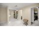 Spacious closet area features marble floors, custom shelving and storage for organizing at 2130 Sw 37Th Street Rd, Ocala, FL 34471