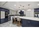 Stunning kitchen with a large island, white countertops, and stainless steel appliances at 2130 Sw 37Th Street Rd, Ocala, FL 34471