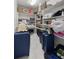 Walk-in closet with custom shelves to maximize storage for all of your clothing at 2130 Sw 37Th Street Rd, Ocala, FL 34471