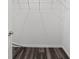 Empty walk-in closet featuring vinyl wood flooring and wire shelving at 22 Fisher Way Pass, Ocklawaha, FL 32179