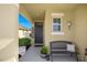 Cozy front porch area with seating and charming decor at 29496 Caspian St, Leesburg, FL 34748