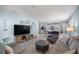 Bright, open-concept living area showcasing stylish furniture at 29496 Caspian St, Leesburg, FL 34748