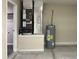 A compact utility area housing the water heater and HVAC system at 2983 Se 145Th Pl, Summerfield, FL 34491