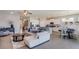 Spacious open floor plan integrating living, dining, and kitchen areas for modern living at 3088 Canopy Oak Blvd, Wildwood, FL 34785
