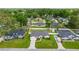 Aerial view of a home in a well-developed neighborhood, boasting lush greenery at 3203 Se 23 Ter, Ocala, FL 34471