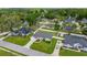 Picture of a home from above, surrounded by lush landscaping and other well-maintained homes at 3203 Se 23 Ter, Ocala, FL 34471