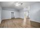 Open living room with vaulted ceiling and modern flooring at 3203 Se 23 Ter, Ocala, FL 34471